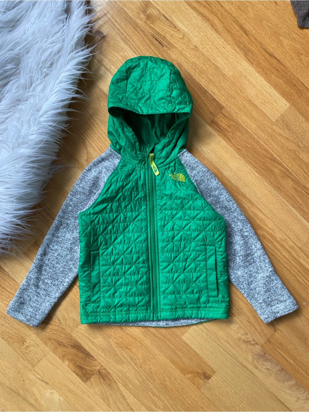 The North Face Green Quilted Hooded Hybrid Jacket with Gray Knit Sleeves